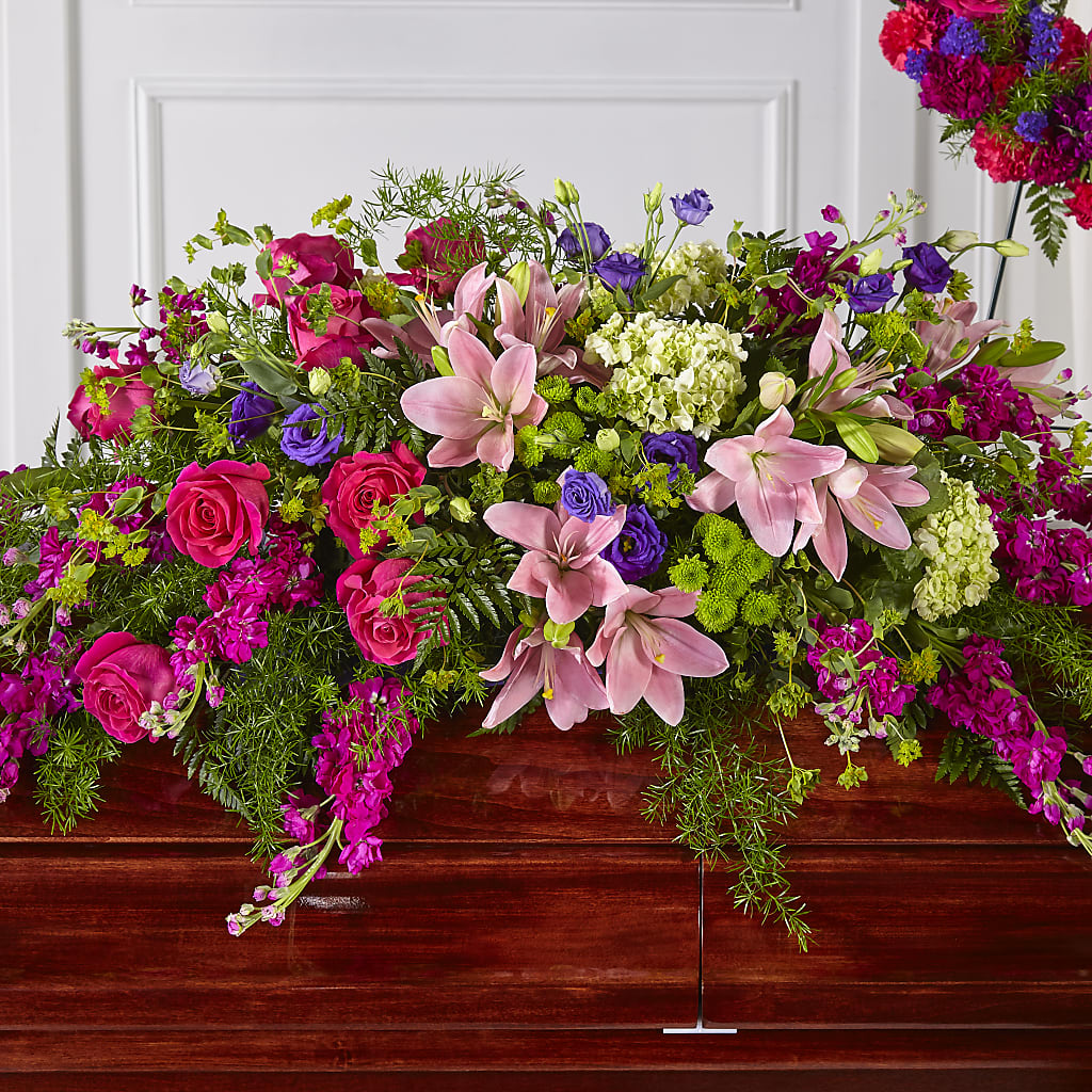 Radiant Tribute Casket Spray – Flowers Unlimited, Martinsburg WV