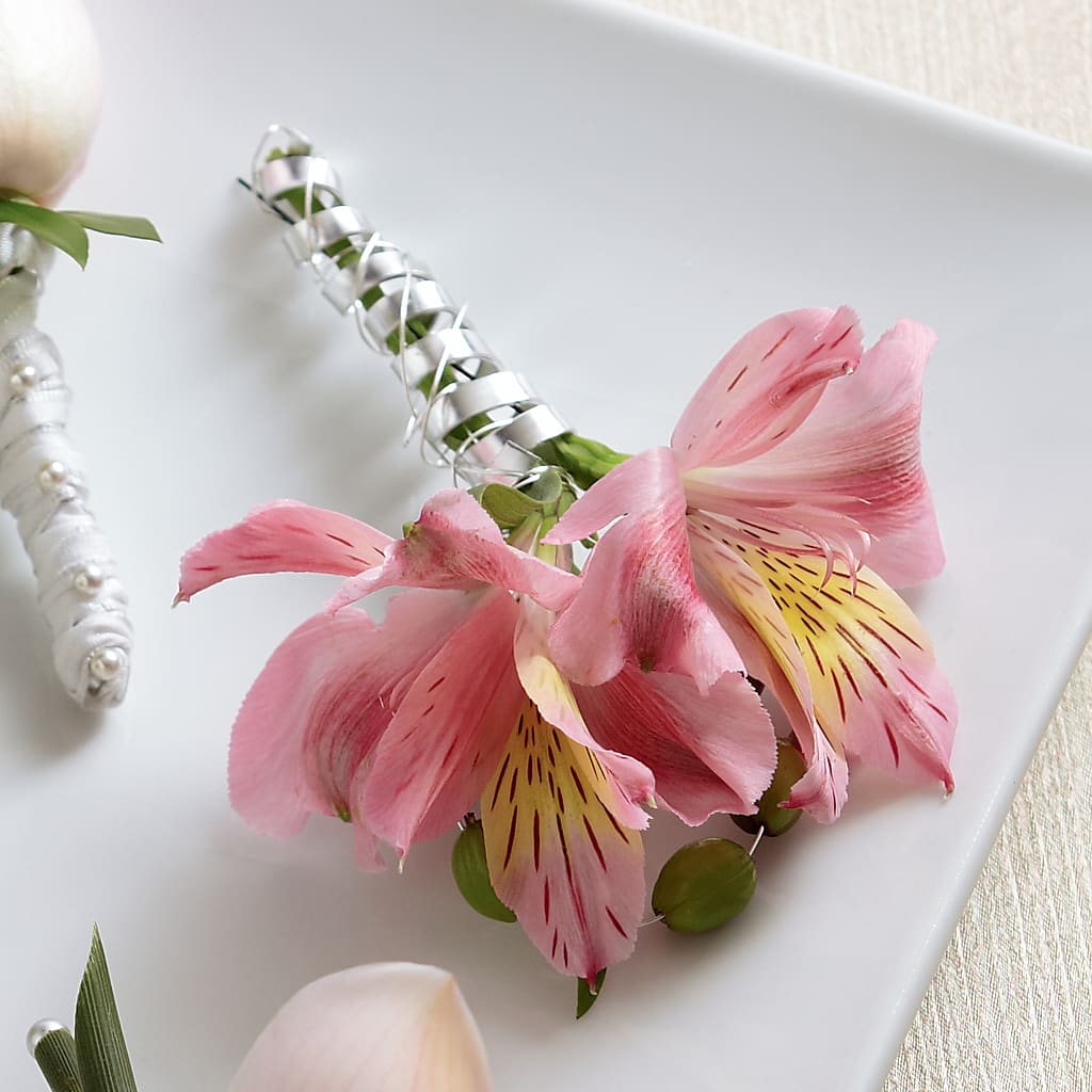 Pink Peruvian Lily Boutonniere – Flowers Unlimited, Martinsburg WV