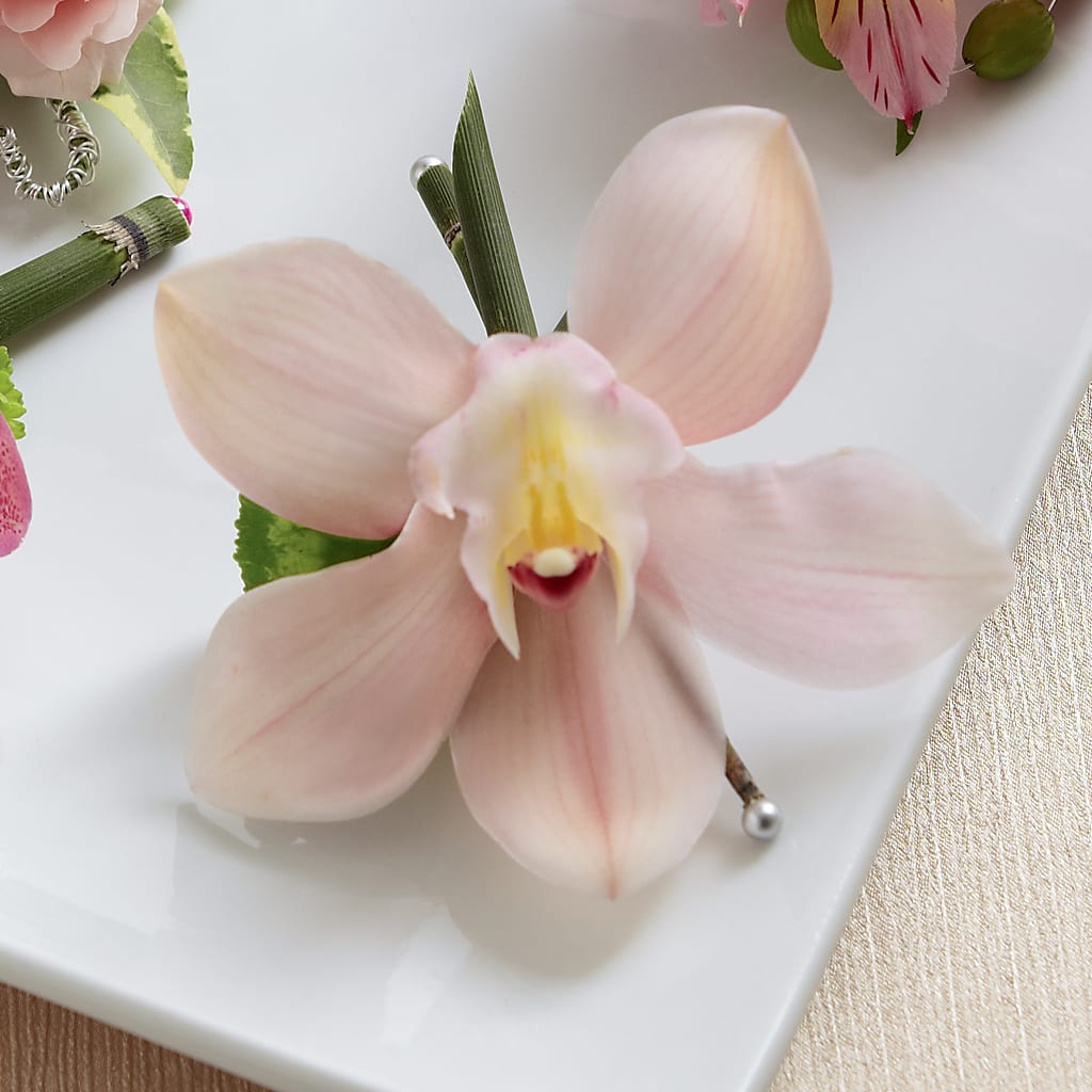 Pink Cymbidium Boutonniere – Flowers Unlimited, Martinsburg WV